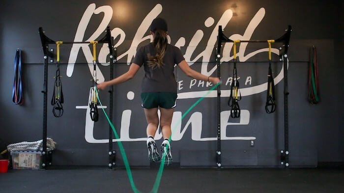 woman jumping ropes